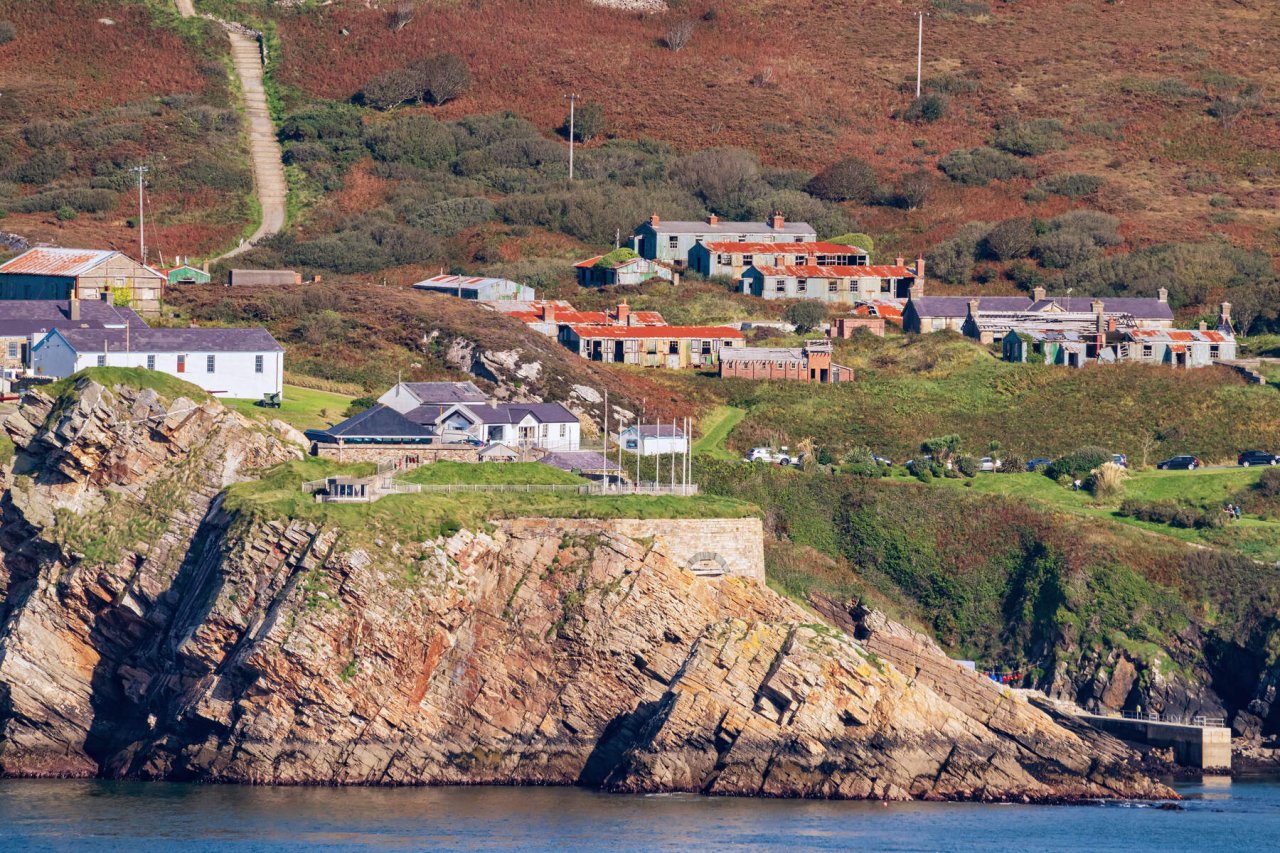 stone fort above rocky edge beside water