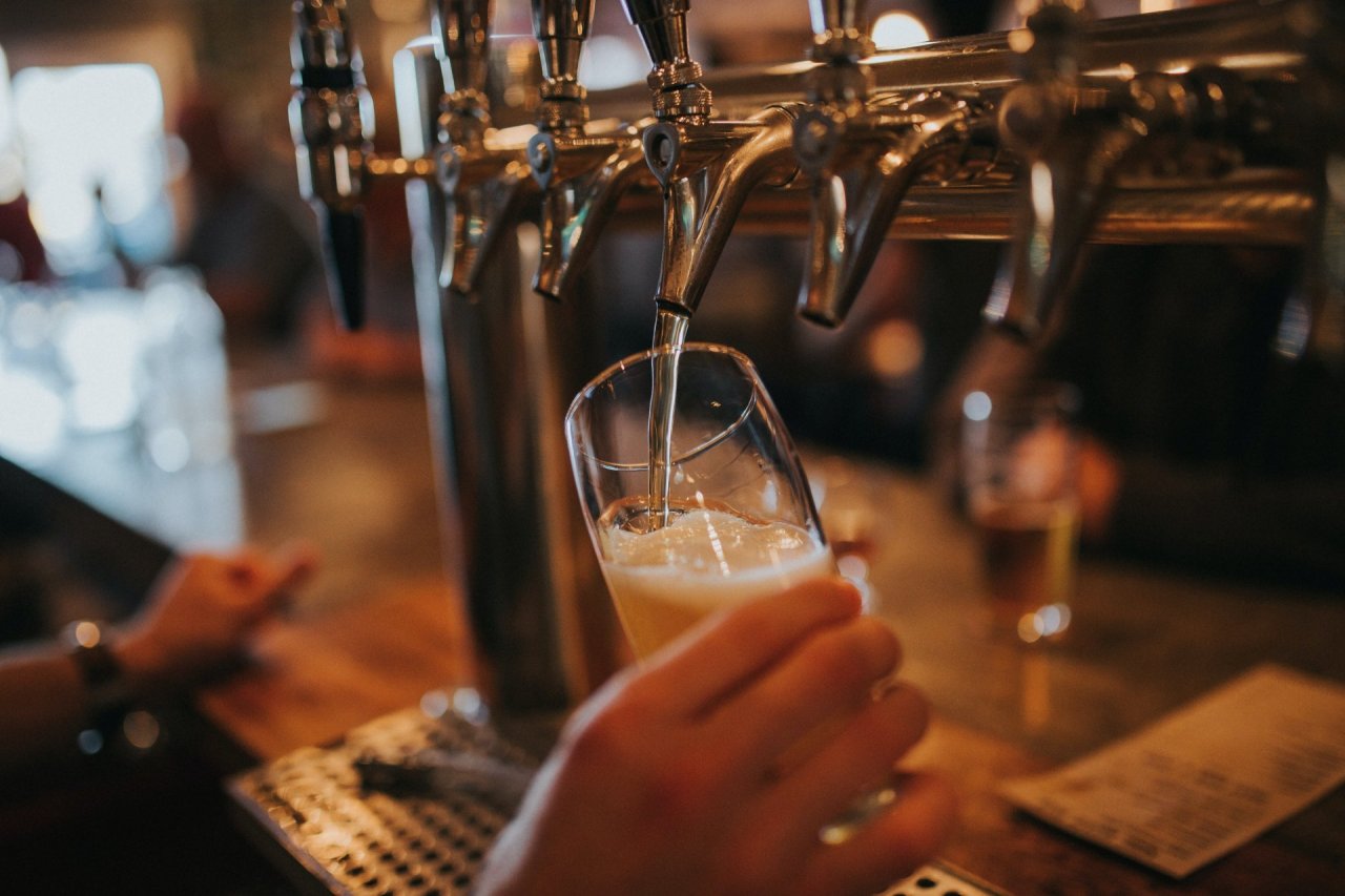 pouring glass of beer